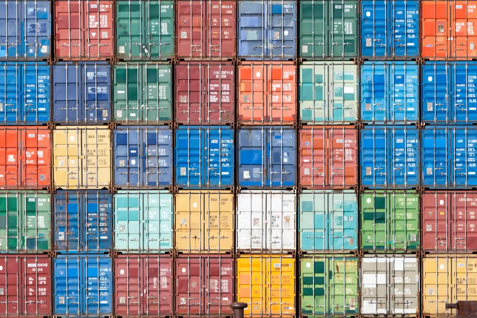 Multilevel stack of colorful shipping containers